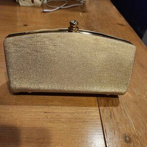 Gold clutch with gold chain strap